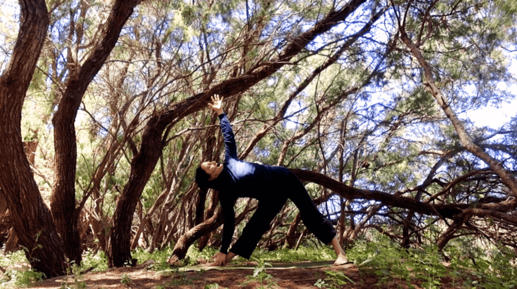 Jyllin in triconasana as part of the wood element yang yoga practice